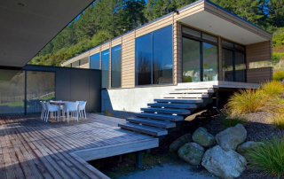Modern home featuring Fijian Mahogany hardwood, sourced from a trusted supplier in Ontario, showcasing premium wood for decks and siding.