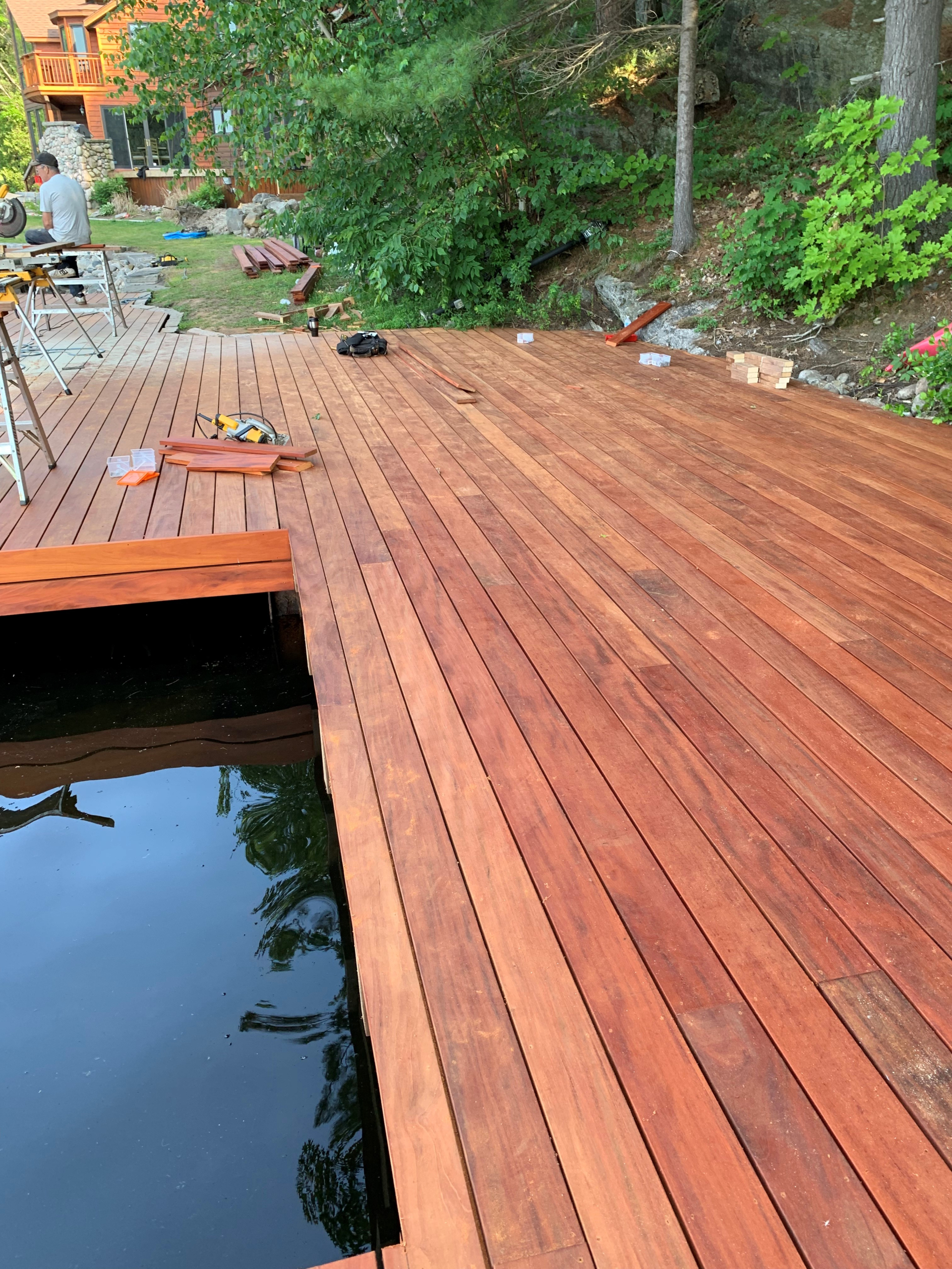 genuine-fijian-mahogany-decking-dock-board-installation-backyard-ideas In-progress installation of Genuine Fijian Mahogany decking as dock boards, ideal inspiration for backyard decks, docks, and lakeside outdoor designs.